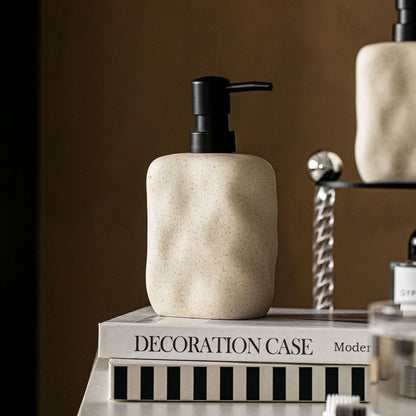 Wave-textured ceramic soap dispenser detail
