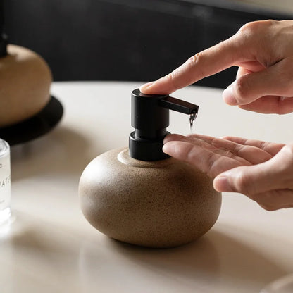 Speckled stoneware-look ceramic pump bottle