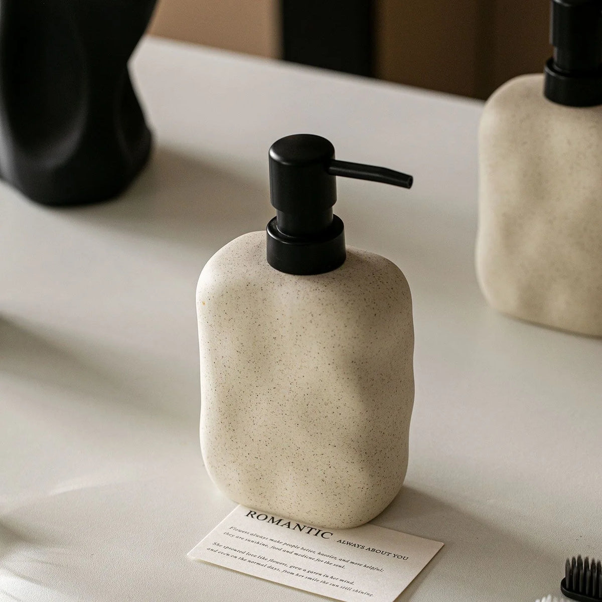 Single wave-textured cream ceramic soap dispenser