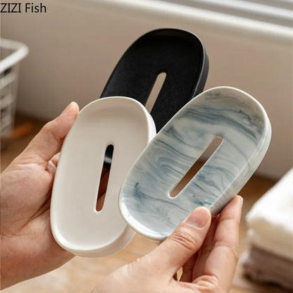 Oval ceramic soap dish with drain second view – ShowerNest Australia