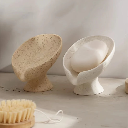Leaf-shaped soap dish holding a soap bar