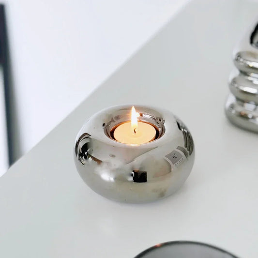 Silver ceramic tealight candle holder with a lit tealight - ShowerNest Australia