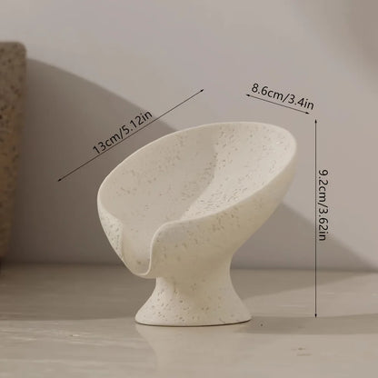 Ivory leaf soap dish on a stand