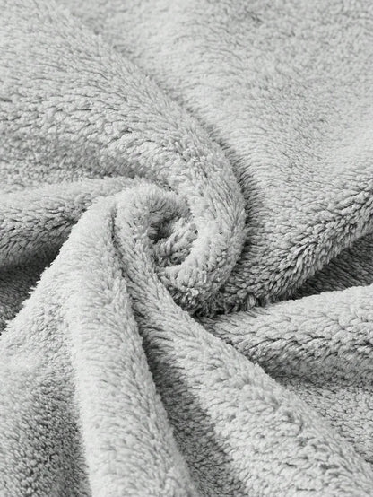 Close-up of the soft grey fabric of the koala hooded towel poncho – ShowerNest Australia