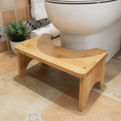 Bamboo toilet step stool in a Mediterranean bathroom