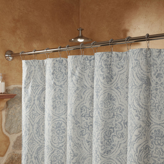 Roller ball shower curtain rings on a rail in a Mediterranean bathroom