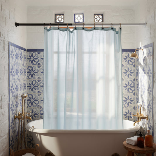 No drill shower curtain rod with white curtain and patterned tiles
