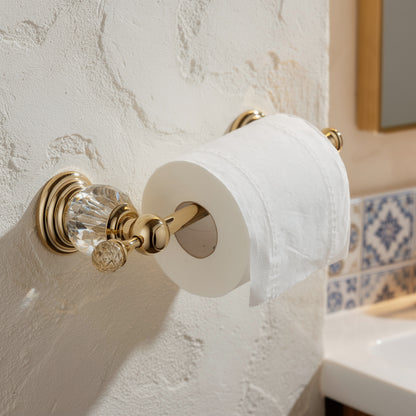 Gold crystal toilet paper holder on a limewashed wall – view 2